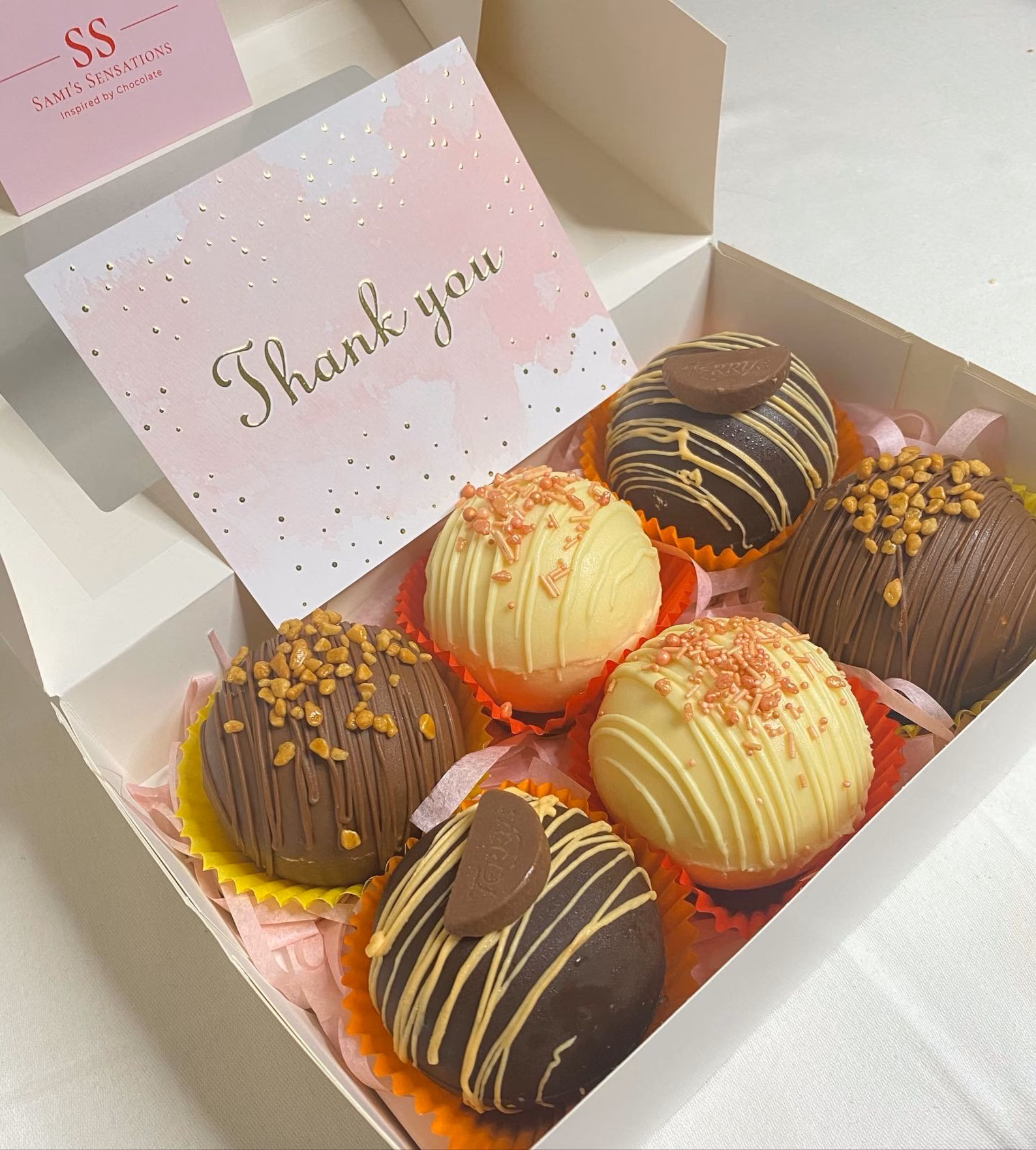 Boxed handmade hot chocolate bombs with Sami's Sensations packaging